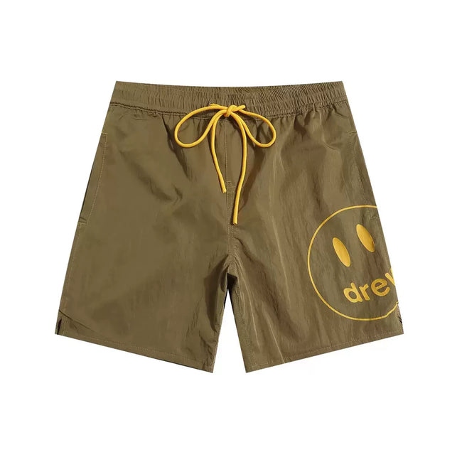 Drew BIEBER's smiling face is a niche American street fashion brand with loose and versatile beach swimming shorts for men and women (4) Hover Image